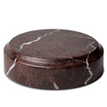 The Curio Plinth marble display stand in Roso Lepanto red on a white background