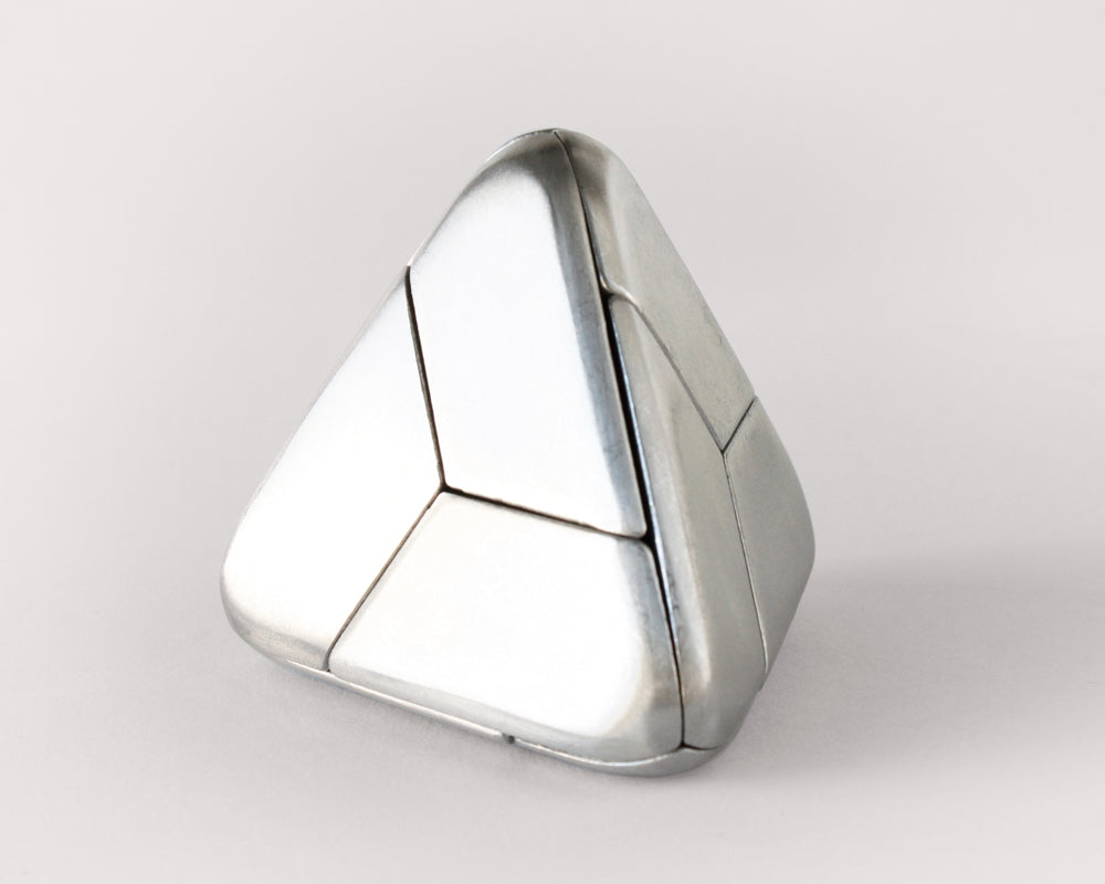 Tetra Puzzle · Stainless Steel Tetrahedron · Curio